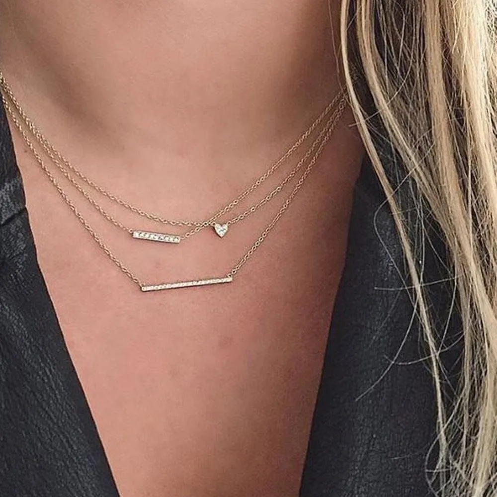 14K ITTY BITTY HEART WITH PAVE DIAMONDS