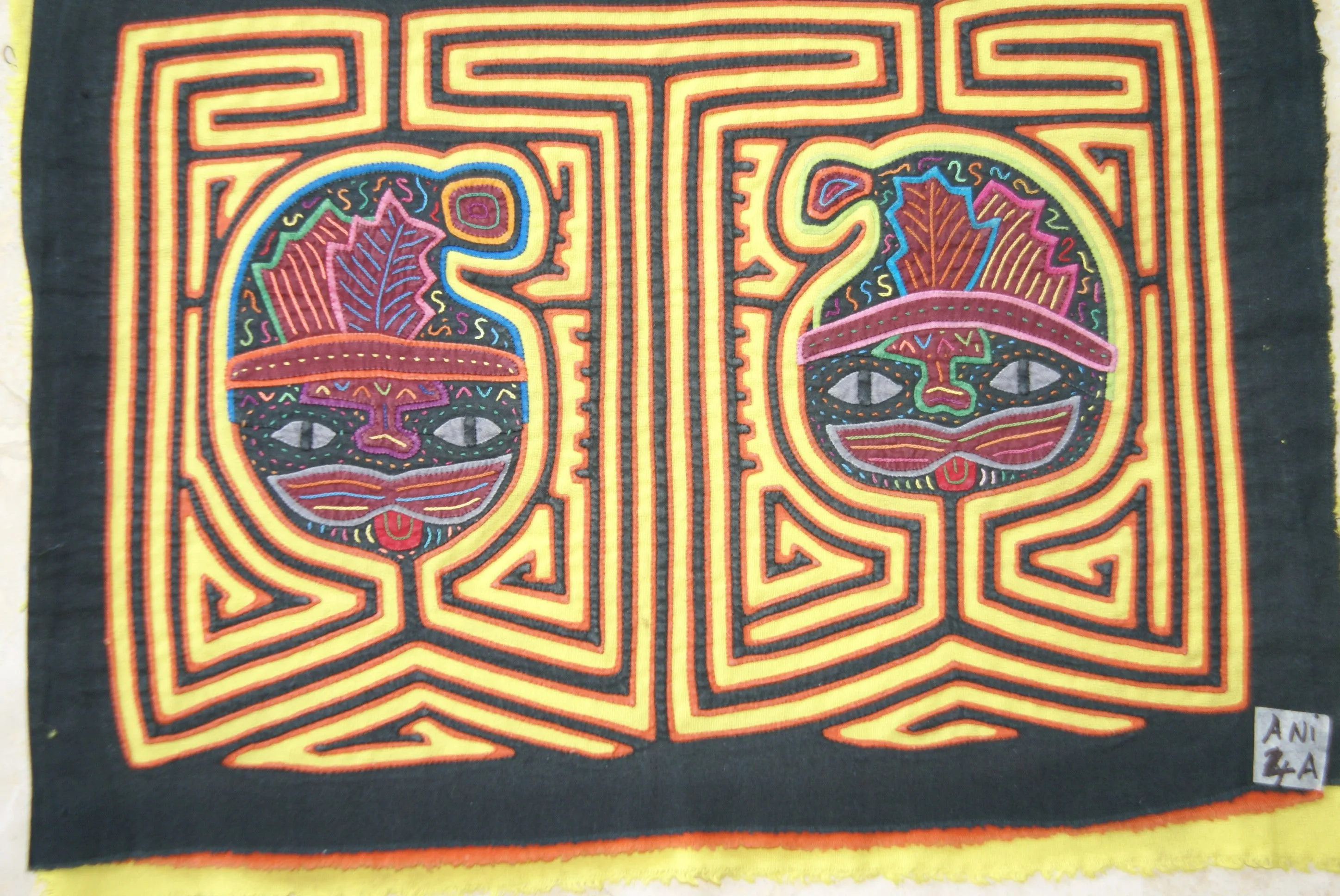 1970's Kuna Indian Mola Blouse Panel from San Blas Islands, Panama. Hand stitched Folk Art Applique: Colorful Geometric Cats in Hats Motif 16.5”x 12.25” (4A)