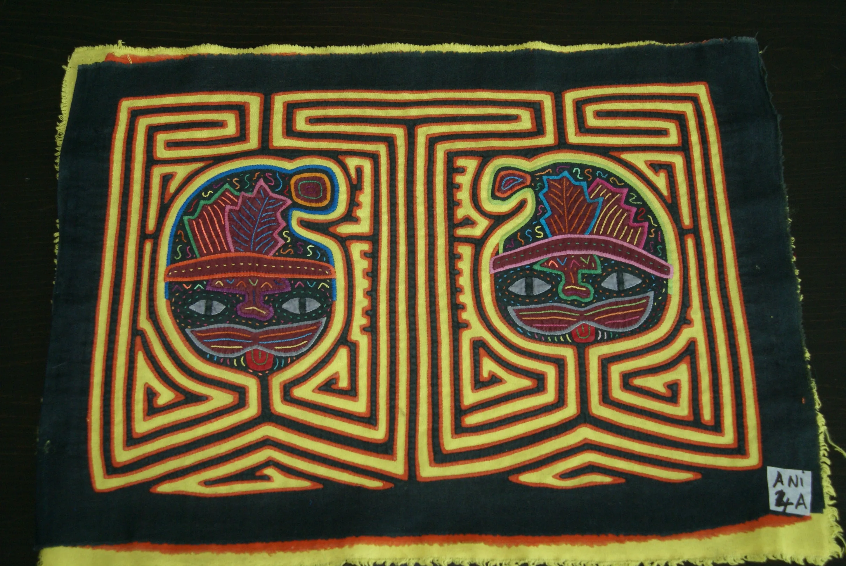 1970's Kuna Indian Mola Blouse Panel from San Blas Islands, Panama. Hand stitched Folk Art Applique: Colorful Geometric Cats in Hats Motif 16.5”x 12.25” (4A)