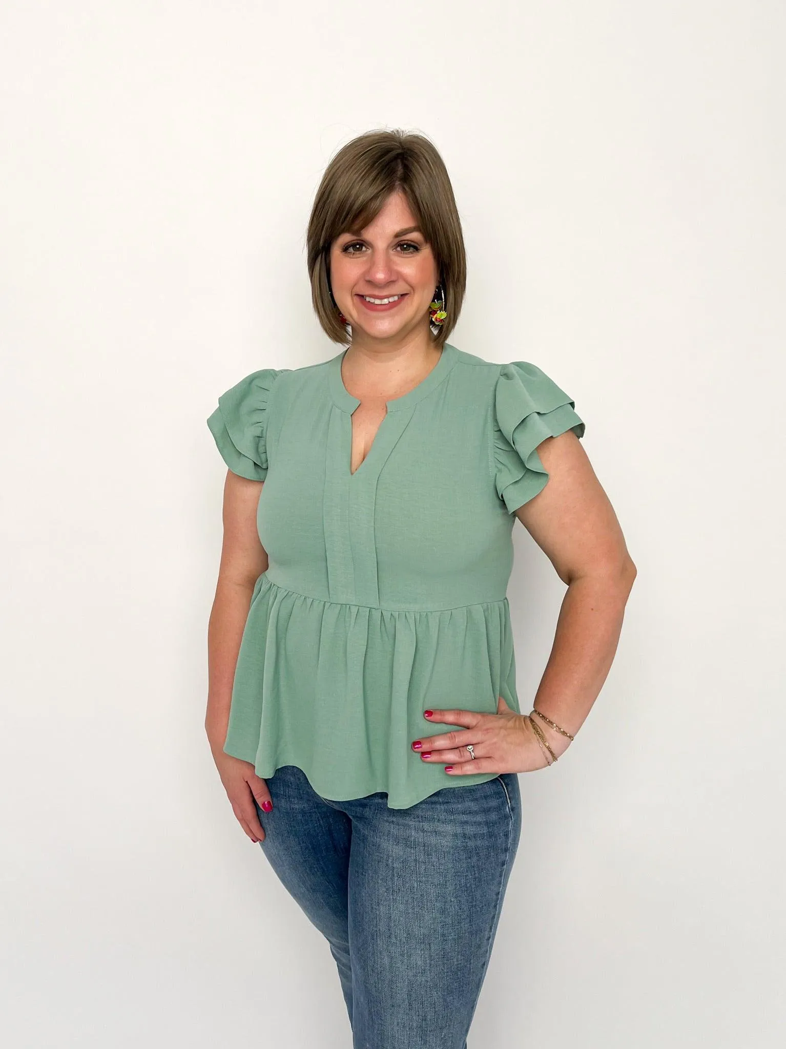 Aloe Peplum Top