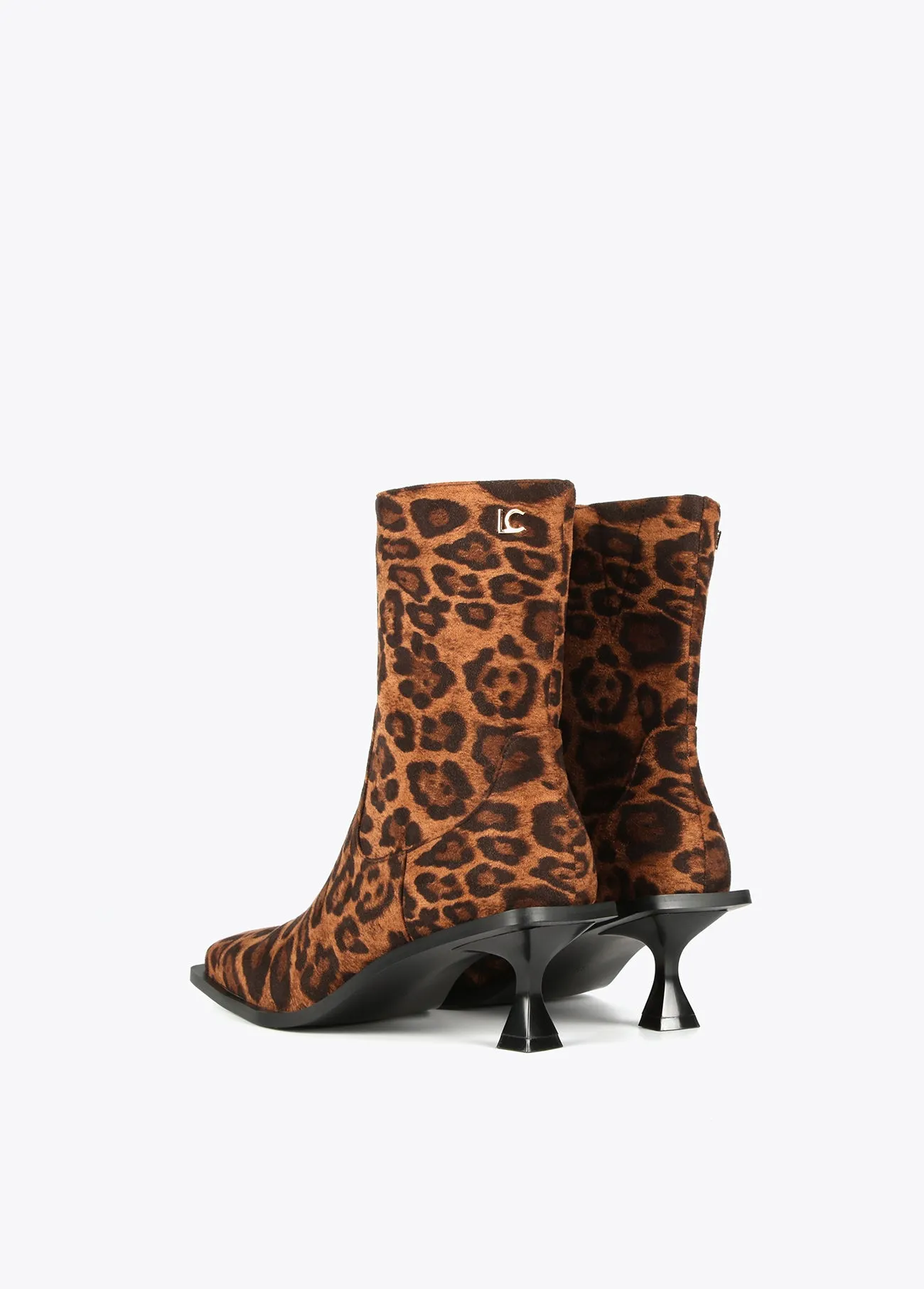 Animal print fabric ankle boots