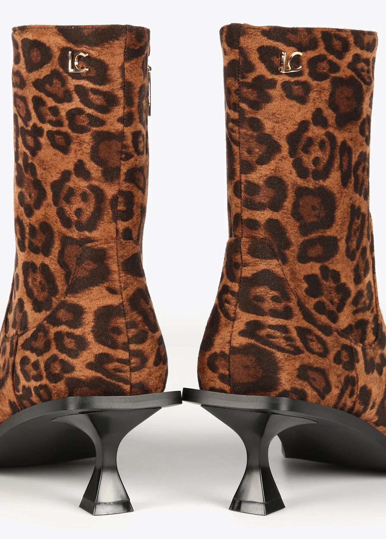 Animal print fabric ankle boots