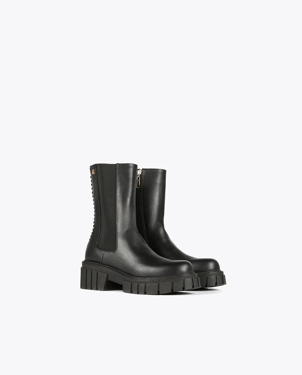 Black ankle boots with chain