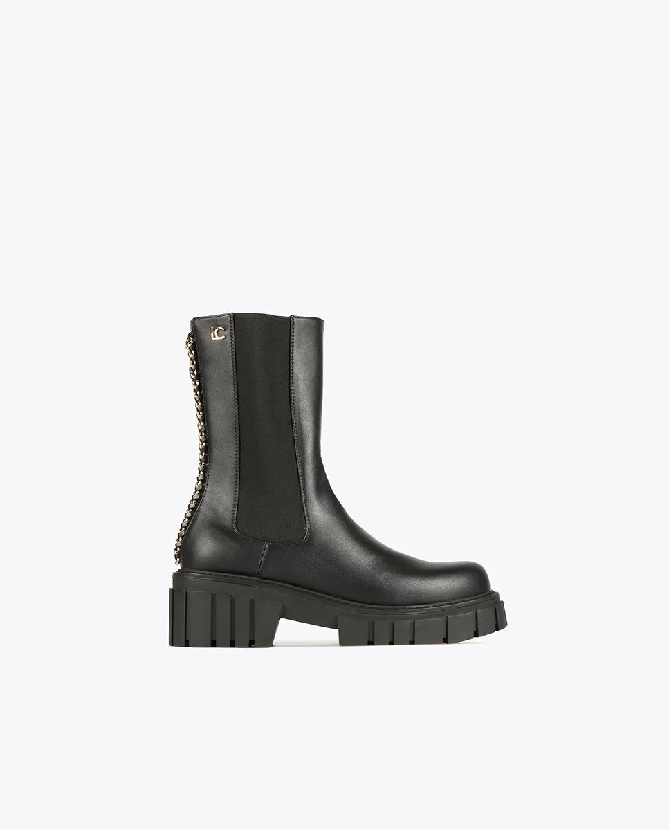 Black ankle boots with chain
