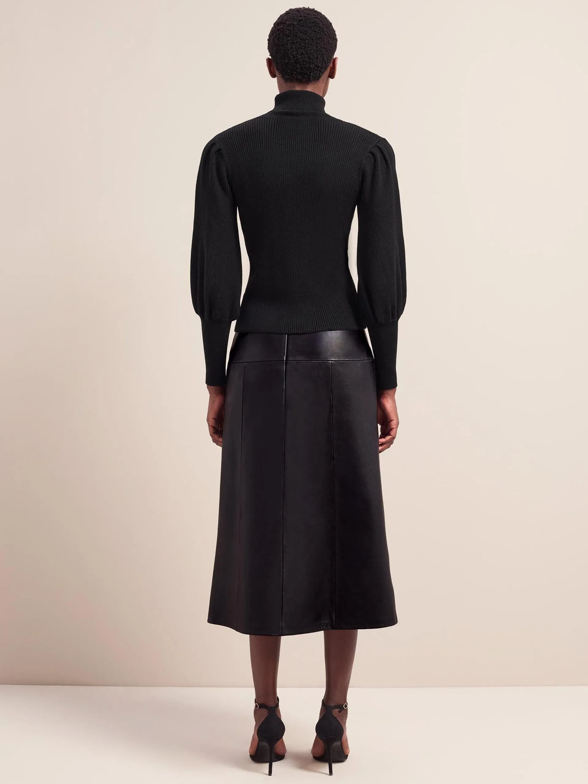 Black Eva wool roll neck jumper