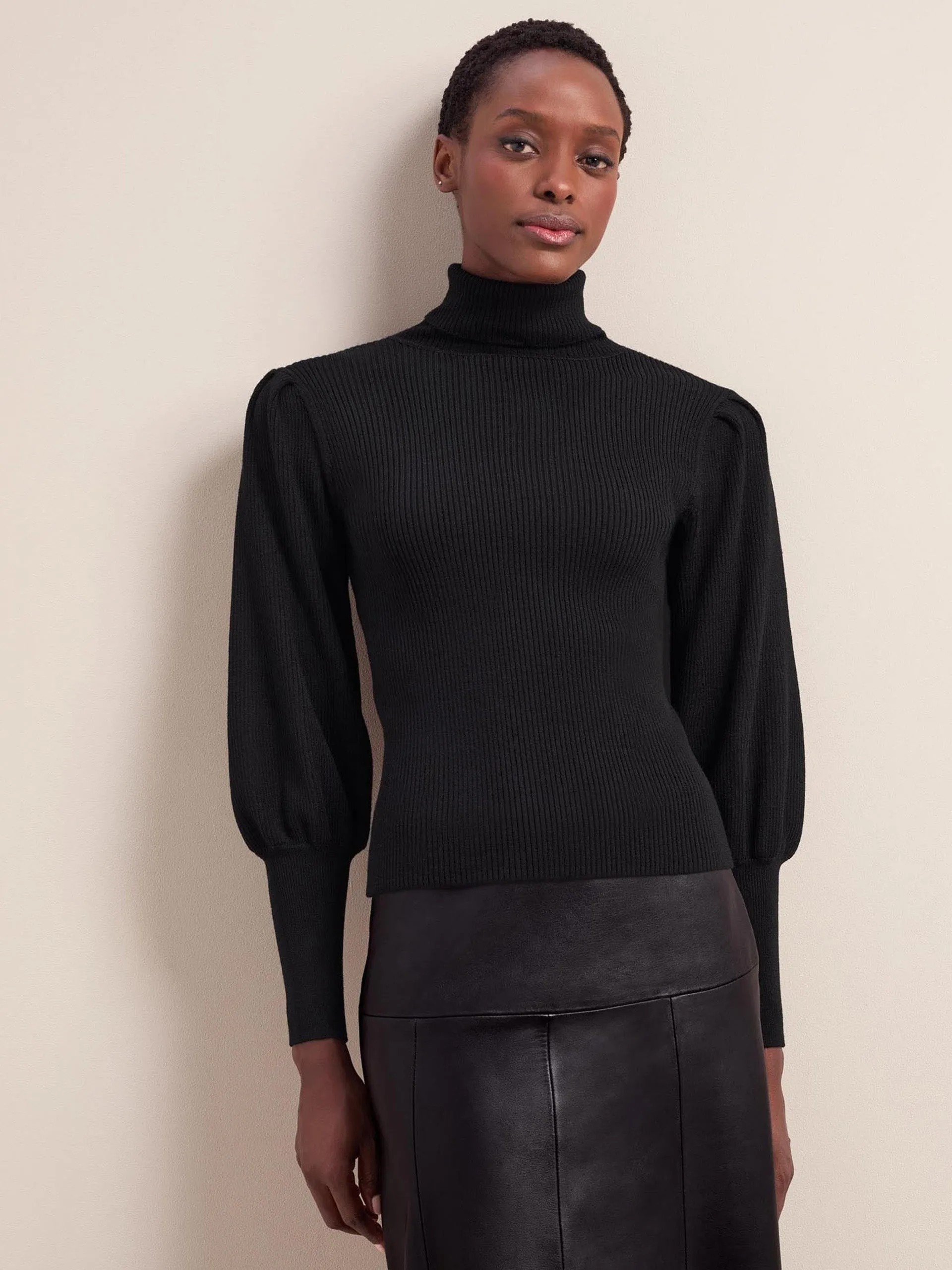 Black Eva wool roll neck jumper
