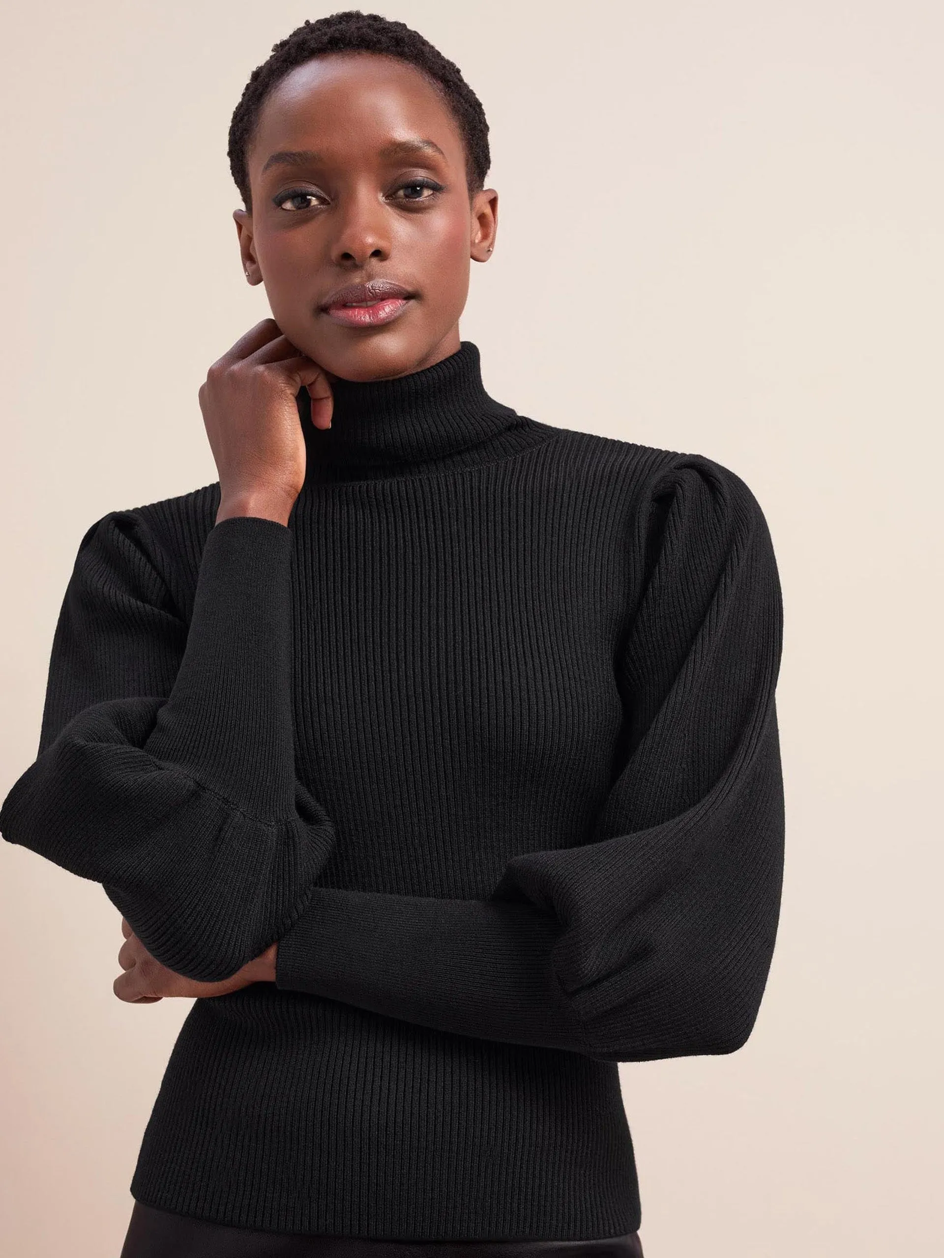 Black Eva wool roll neck jumper