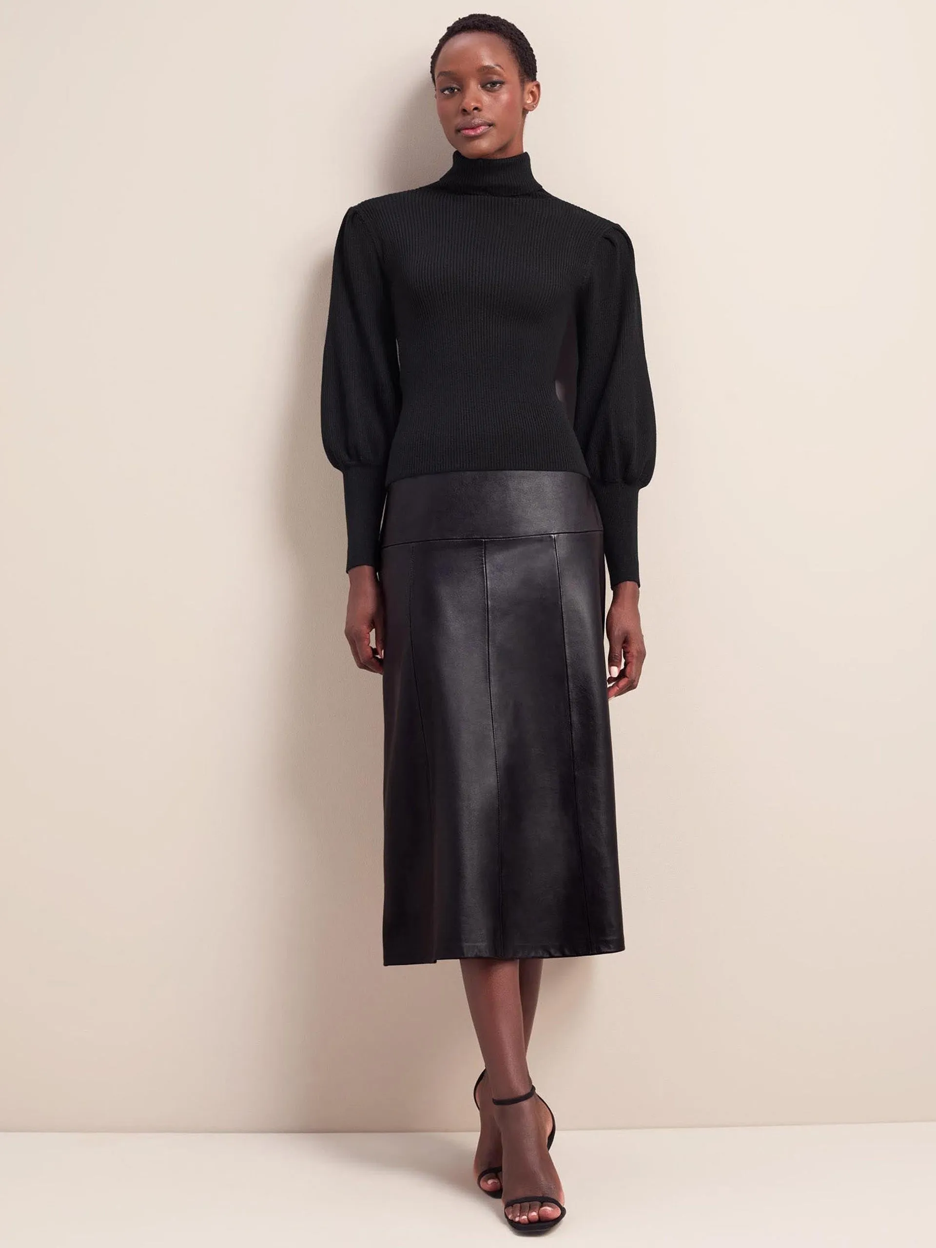 Black Eva wool roll neck jumper