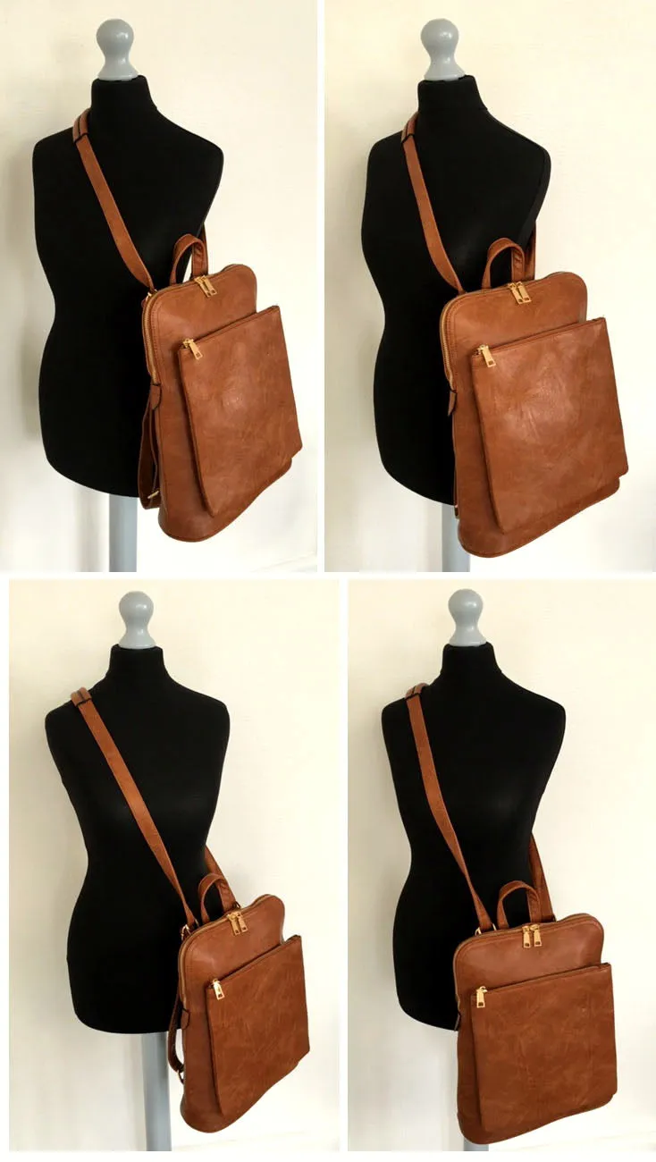 BLACK MULTI COMPARTMENT CROSS BODY BACKPACK