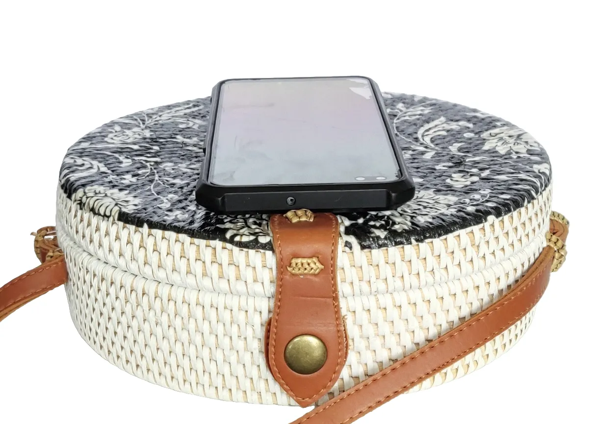 HANDBAG: Decoupage Handwoven Round Rattan Bag in Floral Design and Batik Lining.