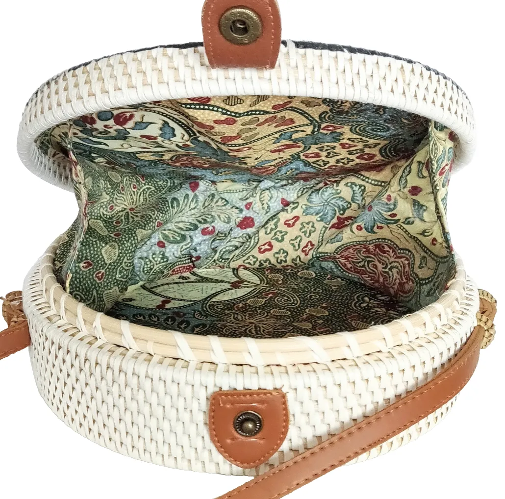 HANDBAG: Decoupage Handwoven Round Rattan Bag in Floral Design and Batik Lining.