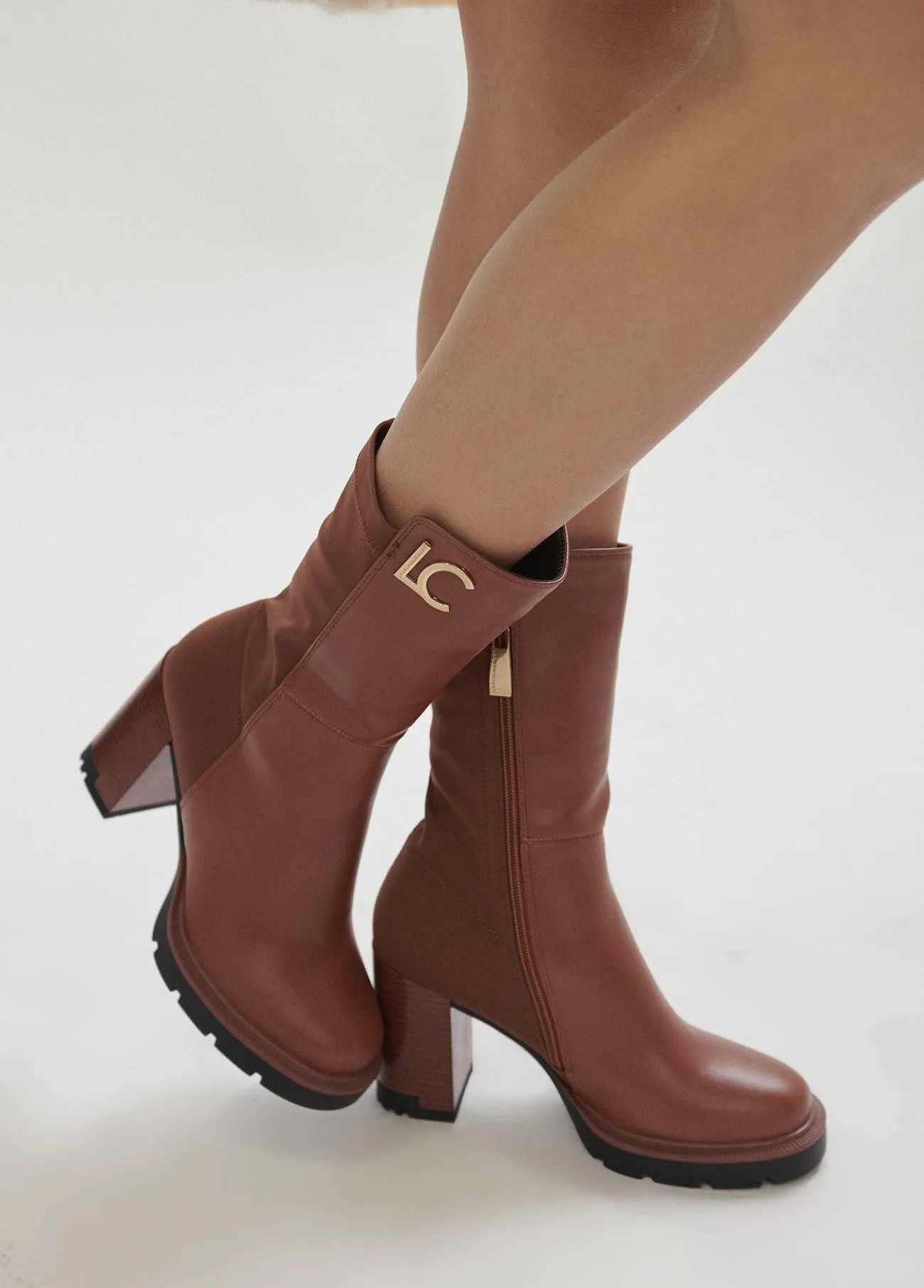 Mid-led ankle boots in two fabrics