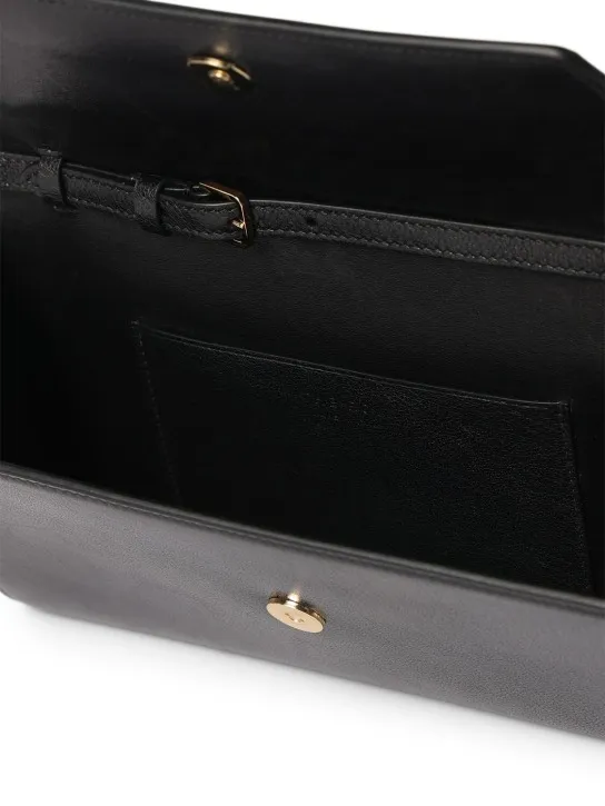 The Row   Evening shiny leather clutch 