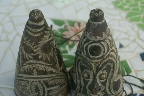 VERY RARE UNIQUE TERRACOTTA FEMALE BREASTS WITH FACES, ONCE PART OF AN ELABORATE CEREMONIAL TUMBUAN DANCE COSTUME WORN BY MEN TO IMPERSONATE WOMEN, SAWOS TRIBE, MIDDLE SEPIK RIVER, PAPUA NEW GUINEA, COLLECTED LATE 1900’S ON THE PREMISES