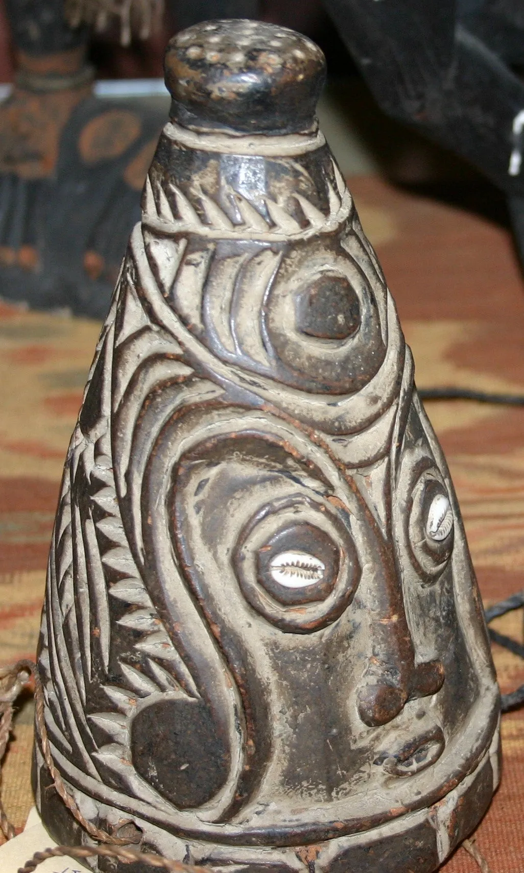 VERY RARE UNIQUE TERRACOTTA FEMALE BREASTS WITH FACES, ONCE PART OF AN ELABORATE CEREMONIAL TUMBUAN DANCE COSTUME WORN BY MEN TO IMPERSONATE WOMEN, SAWOS TRIBE, MIDDLE SEPIK RIVER, PAPUA NEW GUINEA, COLLECTED LATE 1900’S ON THE PREMISES