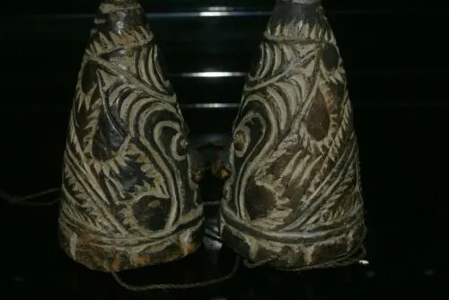 VERY RARE UNIQUE TERRACOTTA FEMALE BREASTS WITH FACES, ONCE PART OF AN ELABORATE CEREMONIAL TUMBUAN DANCE COSTUME WORN BY MEN TO IMPERSONATE WOMEN, SAWOS TRIBE, MIDDLE SEPIK RIVER, PAPUA NEW GUINEA, COLLECTED LATE 1900’S ON THE PREMISES