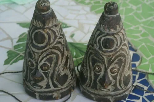 VERY RARE UNIQUE TERRACOTTA FEMALE BREASTS WITH FACES, ONCE PART OF AN ELABORATE CEREMONIAL TUMBUAN DANCE COSTUME WORN BY MEN TO IMPERSONATE WOMEN, SAWOS TRIBE, MIDDLE SEPIK RIVER, PAPUA NEW GUINEA, COLLECTED LATE 1900’S ON THE PREMISES