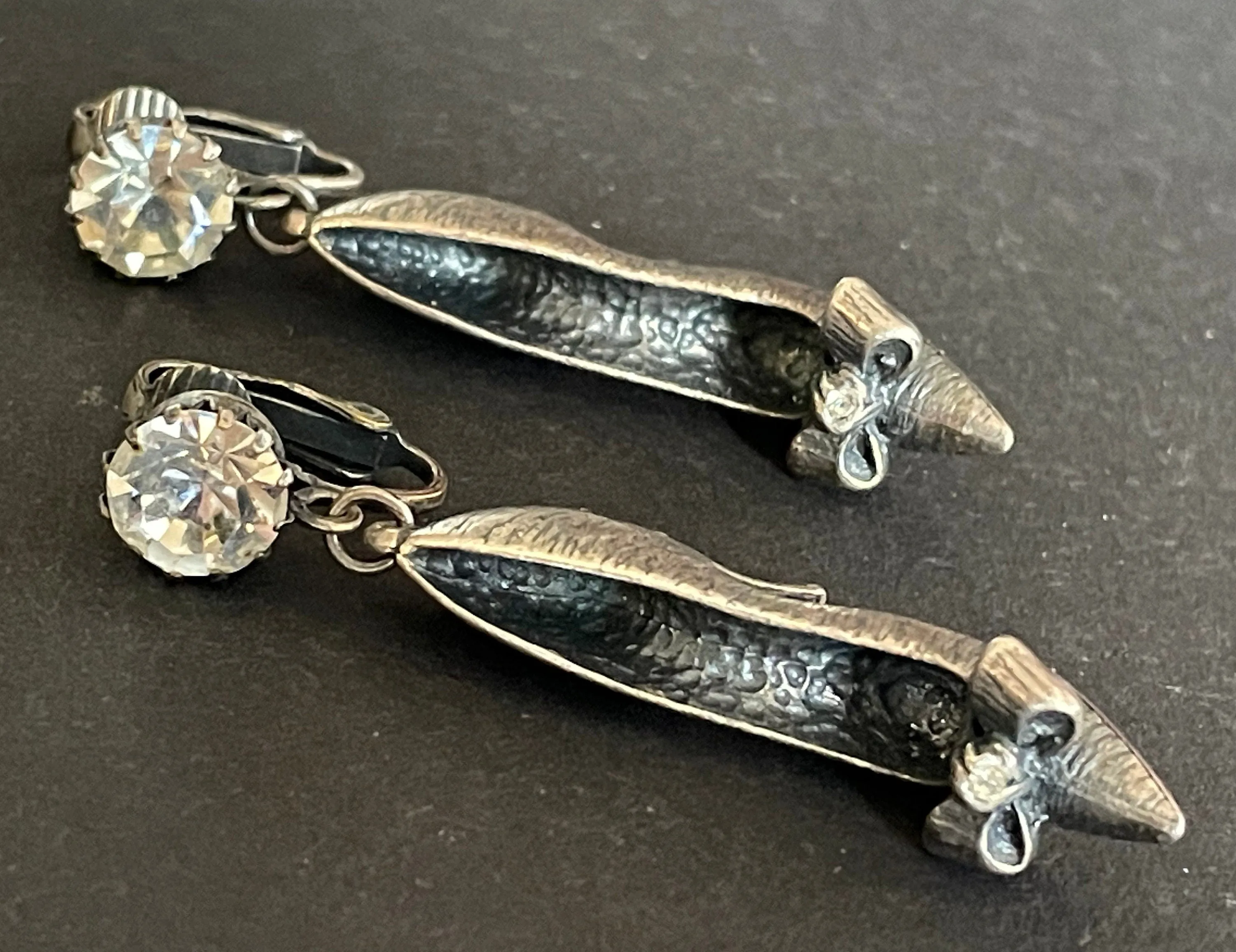 Vintage early Askew London stiletto high heeled shoe statement clip on earrings in chic dark silver tone with clear rhinestones